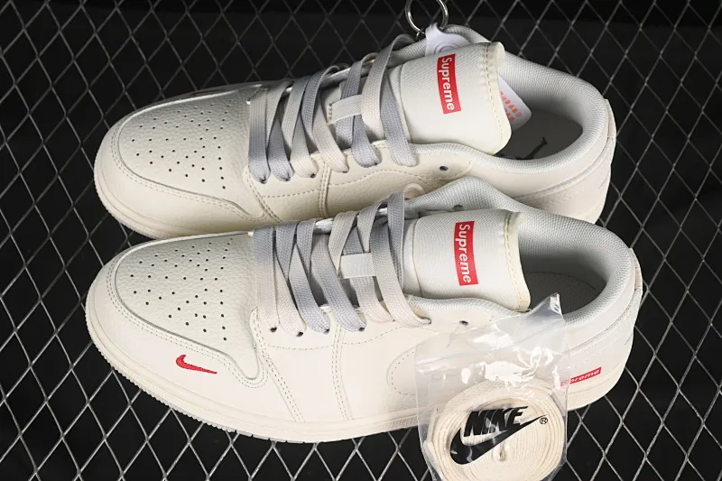All categories Air Jordan Jordan series basketball shoes Air Jordan 1 Low High-end customized low-top sneakers Air Jordan 1 Low AJ1 Joe 1 Supreme co-branded beige and gray two-color high-end customized low-top retro basketball shoes XX3168-175